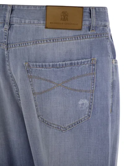 Brunello Cucinelli Five-pocket Leisure Fit Trousers In Lightweight Old Denim With Rips