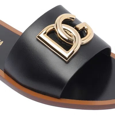 Dolce & Gabbana Flat Leather Slide Sandals With Front Embellishment In Black