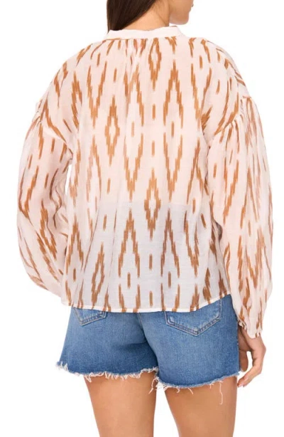 Vince Camuto Ikat Print Split Neck Peasant Top In Neutral