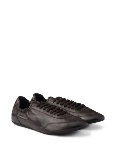 Prada Collapse Leather Sneakers In Black
