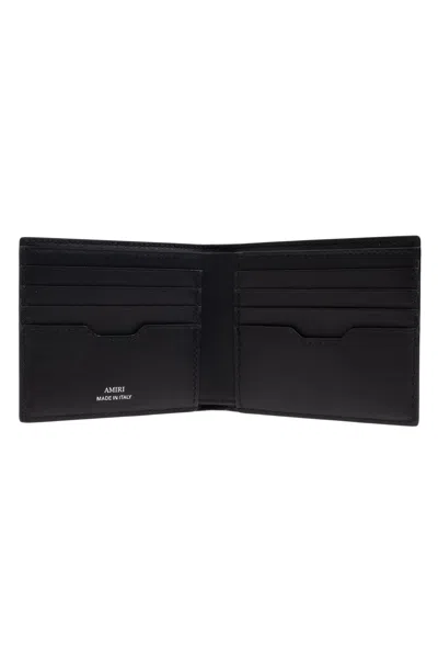 Amiri Bi-fold Wallwt With Logo Lettering On The Front In Leather Man