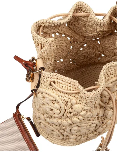 TORY BURCH TORY BURCH MONOGRAMMED RAFFIA BUCKET BAG 