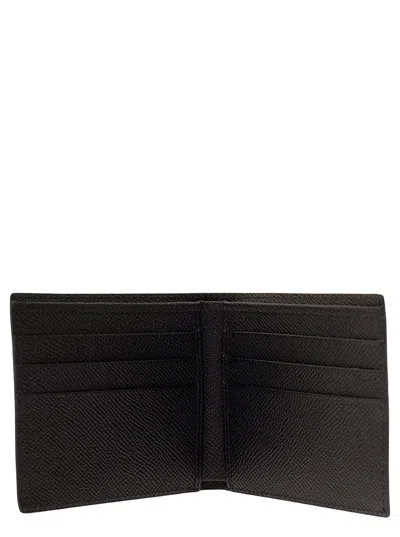 Dolce & Gabbana Black Bi-fold Wallet With Logo Plaque On The Front In Grained Leather Man