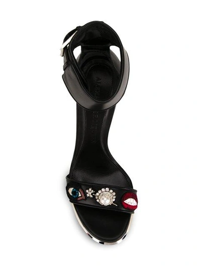 Shop Alexander Mcqueen Buckled Sandals In Black