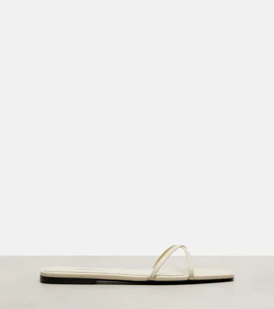 Totême Leather Crossover Slides Off-white
