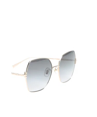 Chopard Gold Titanium Sunglasses In Black