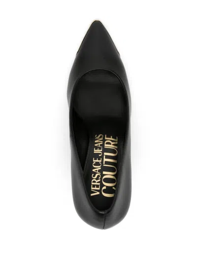 Versace Jeans Couture Elegant Black Pumps With Iconic Gold Accent And Luxurious Leather Finish In Black