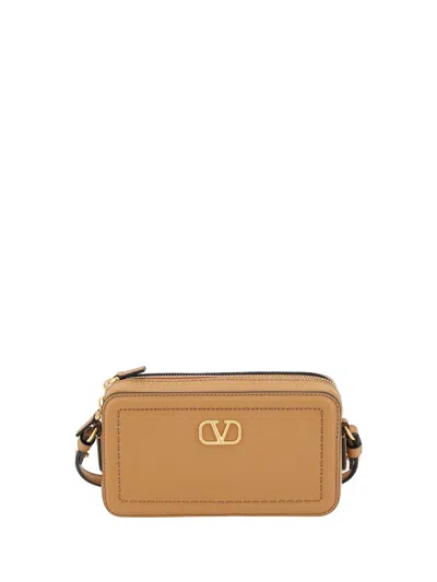 Valentino Garavani Mini Leather Crossbody Bag With Adjustable Strap In Brown