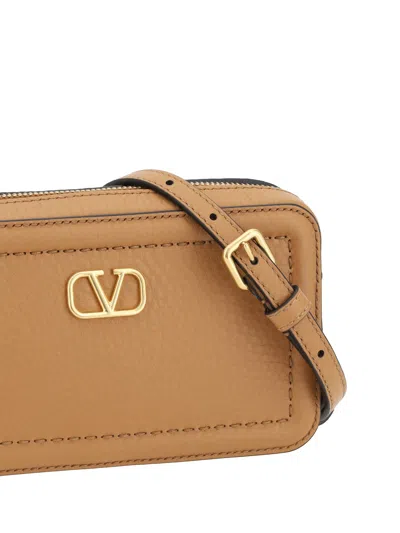 Valentino Garavani Mini Leather Crossbody Bag With Adjustable Strap In Brown