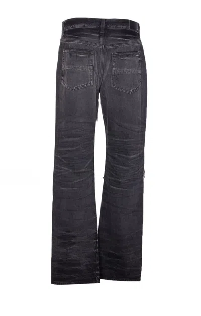Amiri Distressed Denim Trousers With Faded Detailing
