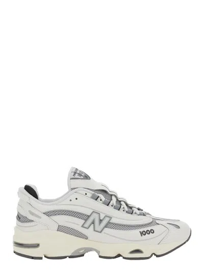 Shop New Balance Grey Low Top Sneakers With Logo Patch On Side And Tongue And Perforated Panels