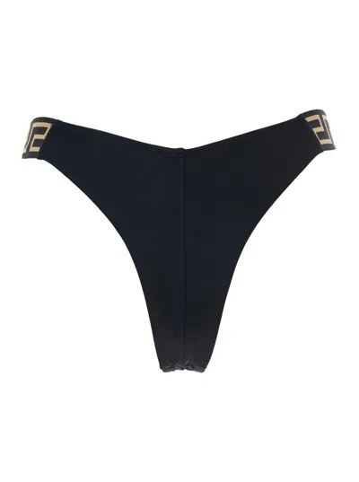 Versace Black Bikini Bottoms With Greca Motif Detail And High Cut In Tech Fabric Stretch Woman In Black