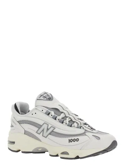 Shop New Balance Grey Low Top Sneakers With Logo Patch On Side And Tongue And Perforated Panels In Tech Fabric Unisex