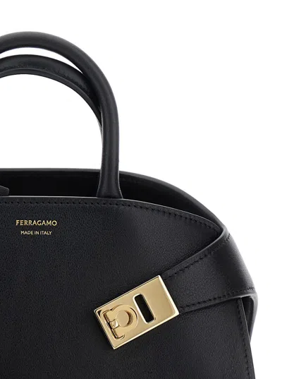 Ferragamo 'hug Small' Black Handbags With Front Printed Logo