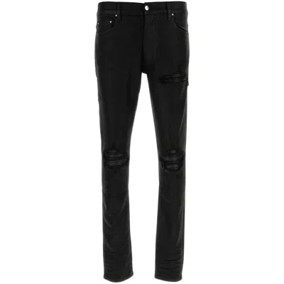Amiri Slim Fit Distressed Trousers With Rivet Detailing In Black
