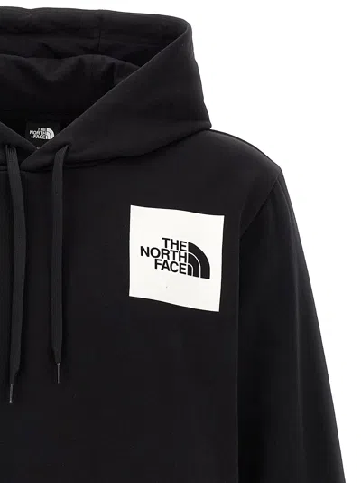 The North Face Logo Patch Drawstring Hoodie In Black