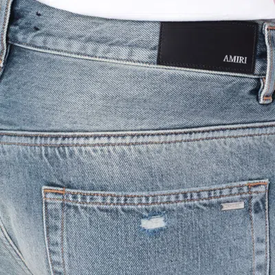 Amiri Straight Leg Mid-rise Distressed Trousers In Gray