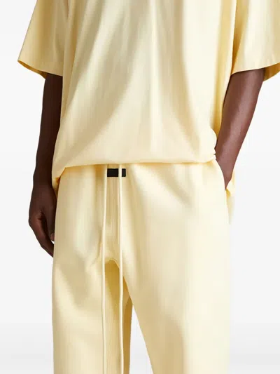 Essentials Essential Track Pants In Yellow