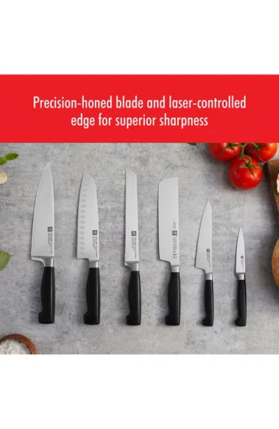 Zwilling Four Star 7" Hollow Edge Santoku Knife