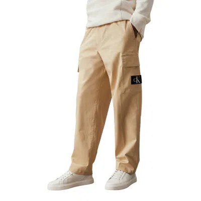 Shop Calvin Klein Beige Cotton Jeans & Men's Pant