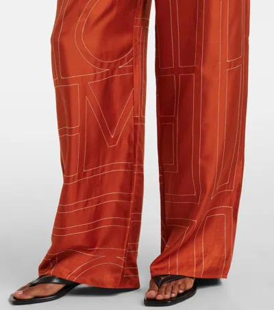Totême Toteme Women Monogram Silk Pajama Pants In Orange