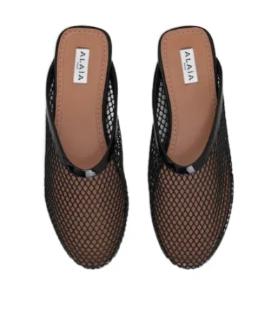 Alaïa Fishnet Flat Mules Rubber Sole In Black