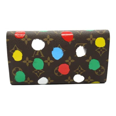 Pre-owned Louis Vuitton Brown Coated Canvas Monogram Pvc Long Wallet (bi-fold) ()