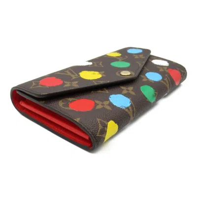 Pre-owned Louis Vuitton Brown Coated Canvas Monogram Pvc Long Wallet (bi-fold) ()
