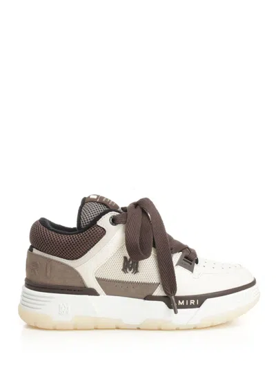 Amiri Brown Low Top Sneakers With Logo Detail On The Side And Mesh Panels In Brown