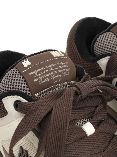 Amiri Brown Low Top Sneakers With Logo Detail On The Side And Mesh Panels In Brown