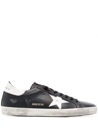 Golden Goose 'super-star' Black Low Top Sneakers With Logo Patch And Suede Details In Leather Man