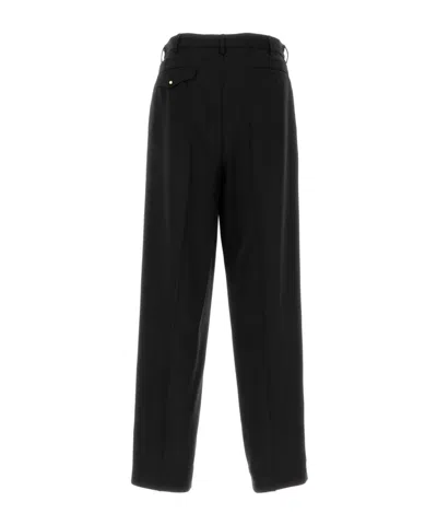 Magliano Wide-leg Wool Trousers With Pockets And Pleats In Black