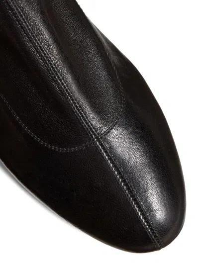 Khaite Apollo Leather Flat Ankle Boots