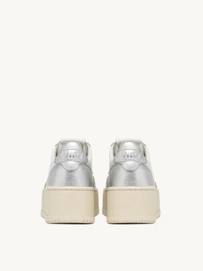 Autry White And Silver Low Top Platform Sneakers With Logo