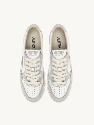 Autry White And Silver Low Top Platform Sneakers With Logo