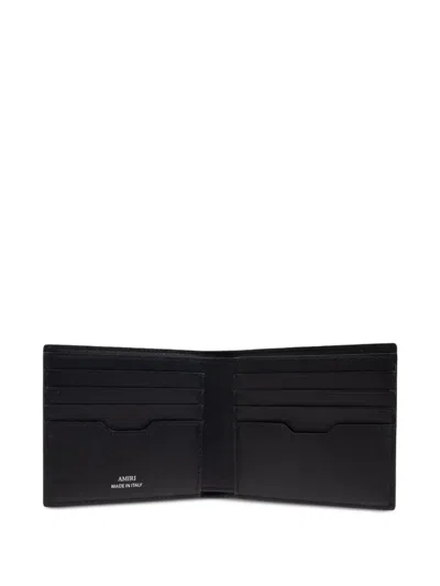 Amiri Bi-fold Wallwt With Logo Lettering On The Front In Black