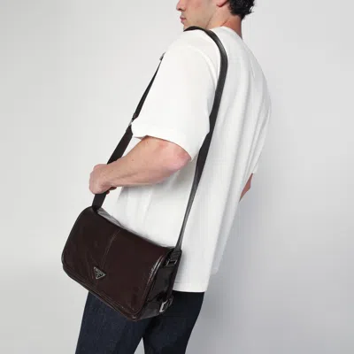 Prada Triangle Logo Leather Messenger Bag In Brown