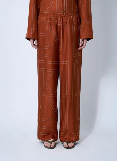 Totême Toteme Women Monogram Silk Pajama Pants In Orange