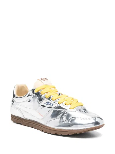 Autry Front Lace Sneakers In Bright Yellow And Shiny Silver In Multi
