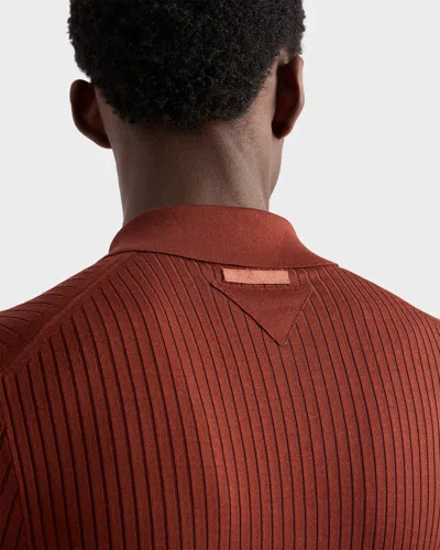 Prada Ribbed Knit Cotton Polo Shirt In Brown