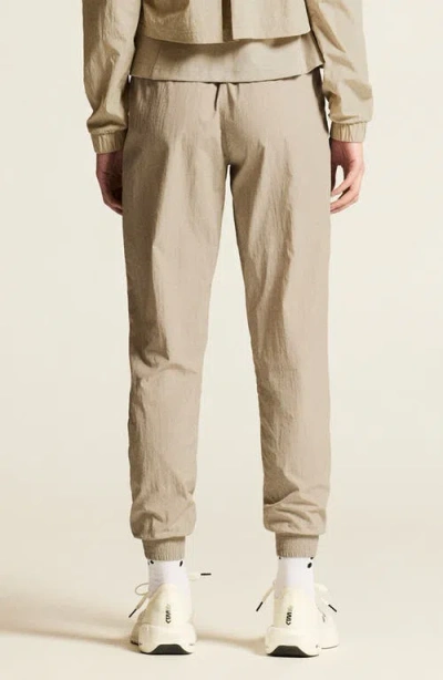 Craft Join Wind Joggers In Brown