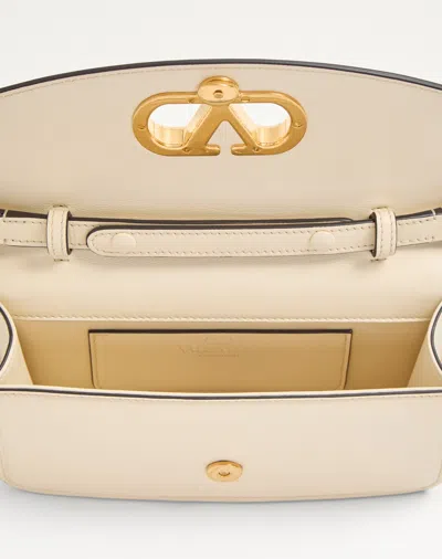 Valentino Garavani Small Leather Clutch With Adjustable Chain Strap In White