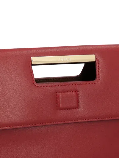 Furla Logo Engraved Medium Clutch Bag In Red
