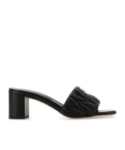 Miu Miu Logoed Sandals In Black