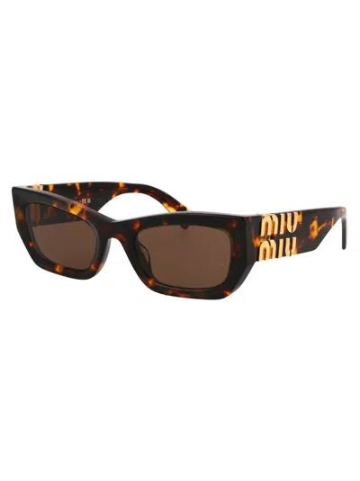 Miu Miu Eyewear Rectangular Frame Sunglasses