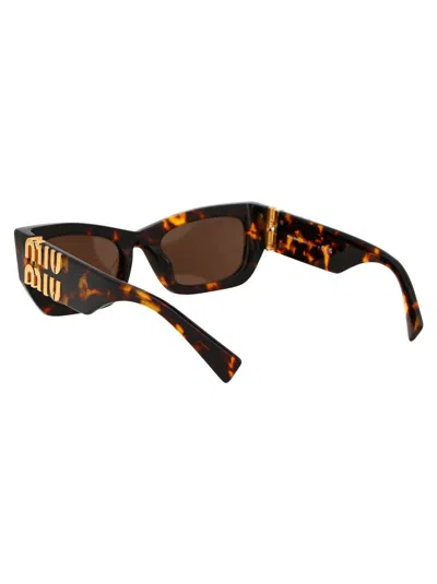 Miu Miu Eyewear Rectangular Frame Sunglasses