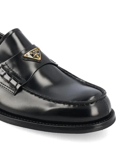 Prada Triangular Plaque Loafers
