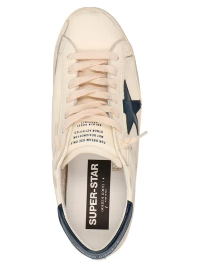 Golden Goose Men 'super-star' White Low Top Sneakers With Embossed Logo And Contrasting Heel Tab In