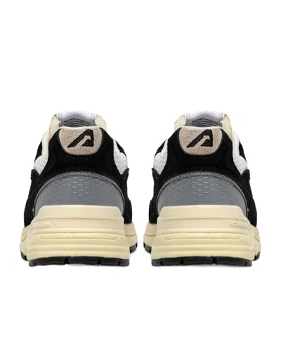 Autry Leather And Fabric Sneakers In Black