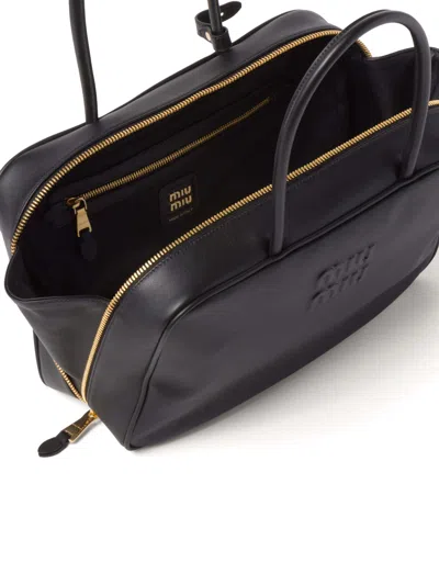 Miu Miu Black Bauletto Bag Zip Embossed Logo In Multi